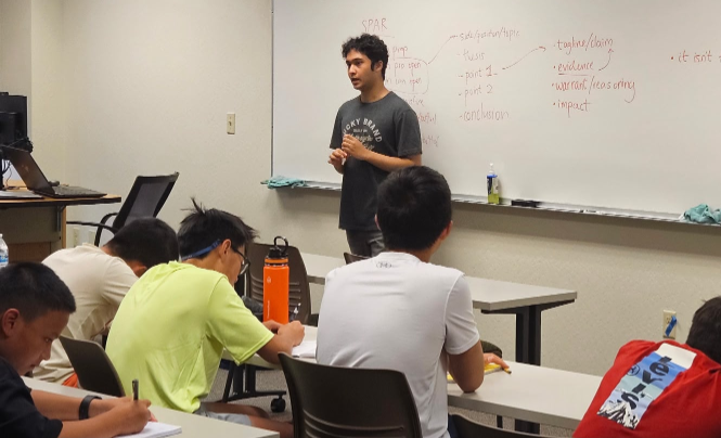 Anshuman teaching public speaking and debate to middle school students during 2026 summer camp in Reno